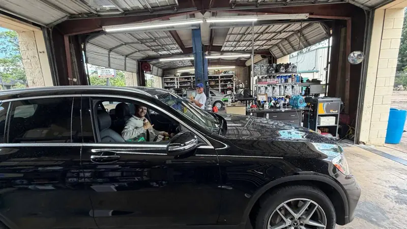 Car in the emissions testing bay